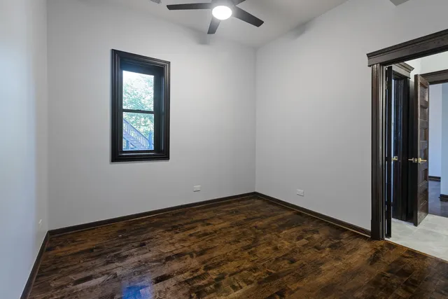 a bathroom with a shower and a toilet