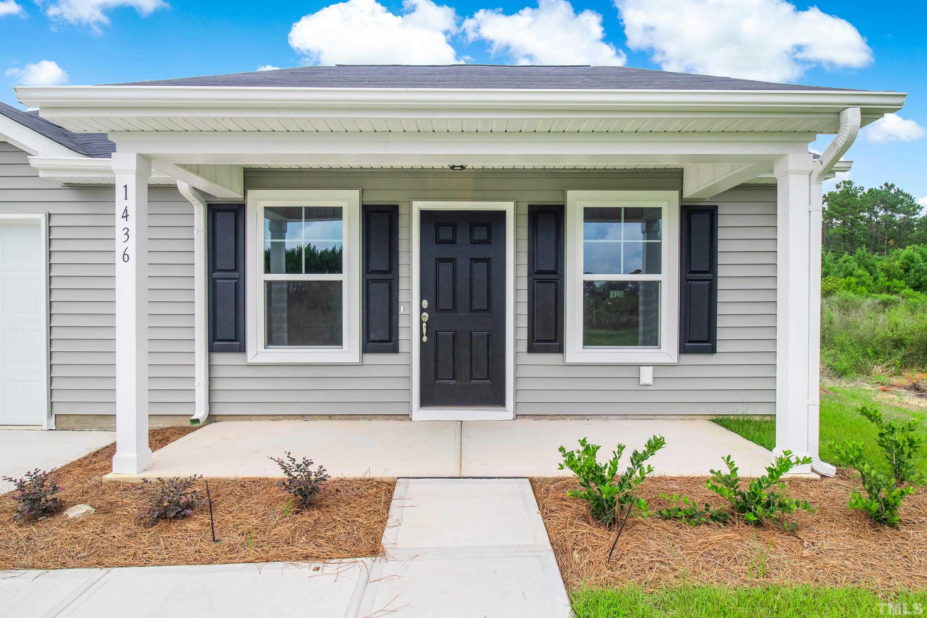385 Dasu Drive Clayton, NC 27520 - Photo 5 of 33 a front view of a house