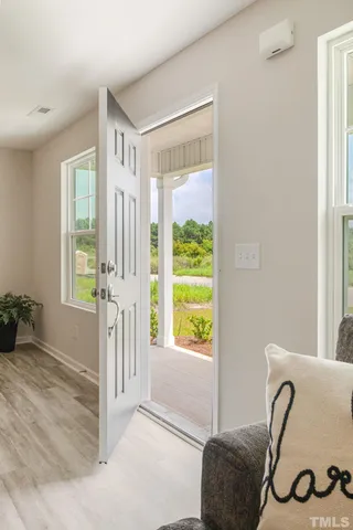 a view of livingroom with furniture and windows