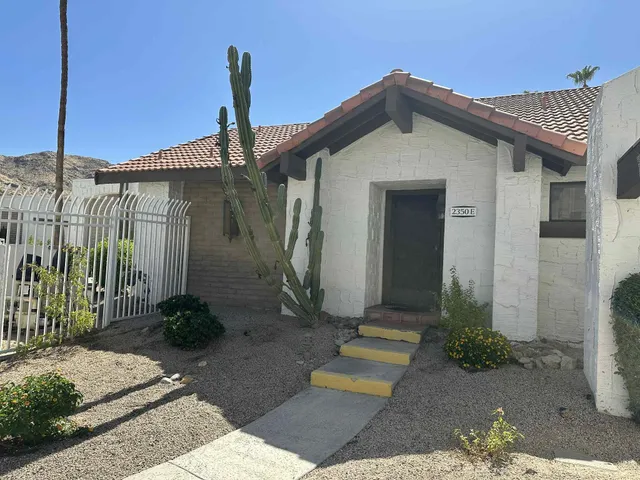 a view of entryway with livingroom and wooden floor