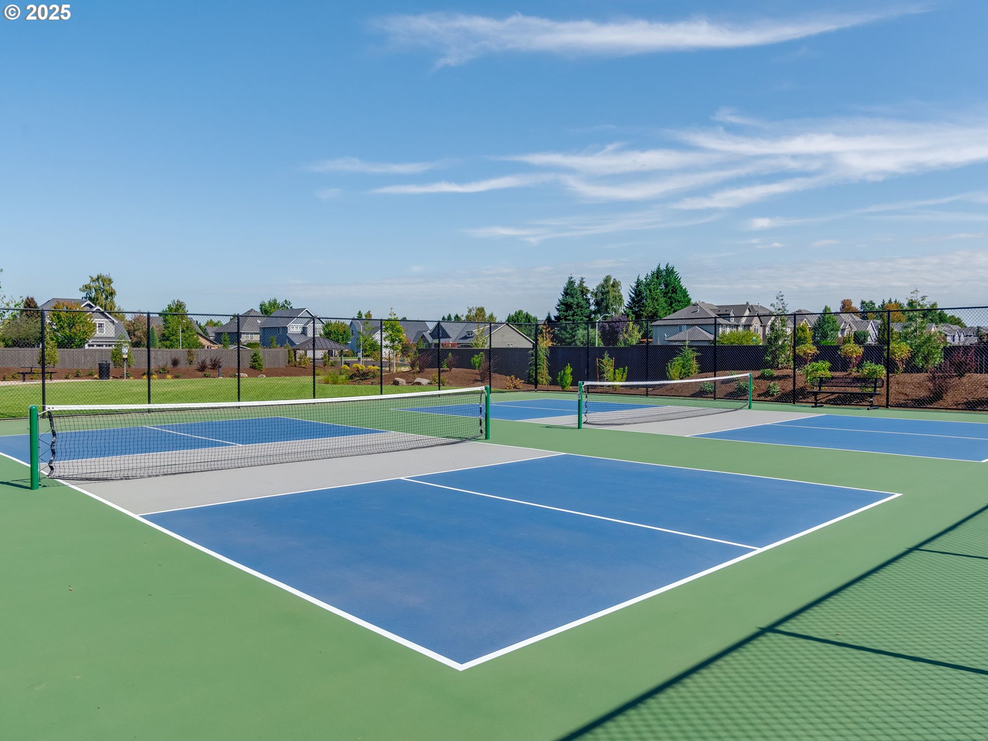 1146 Southeast 18th Avenue Canby, OR 97013 - Photo 13 of 17 a view of an outdoor space and tennis court