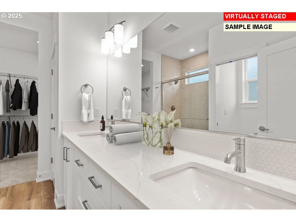 1146 Southeast 18th Avenue Canby, OR 97013 - Photo 6 of 17 a bathroom with a double vanity sink and a mirror