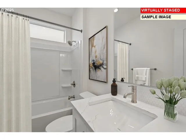 a bathroom with a sink a mirror and a shower