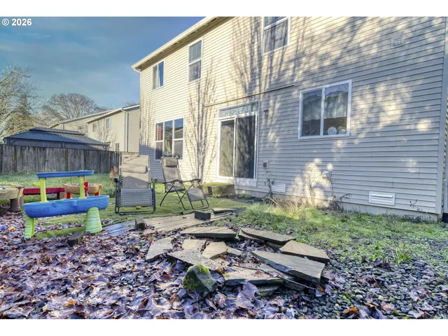 a backyard of a house with lots of green space