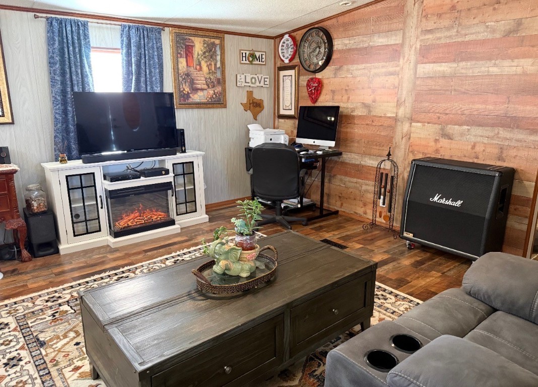 18504 Noyce Road Crosby, TX 77532 - Photo 11 of 24 a living room with furniture and a fireplace