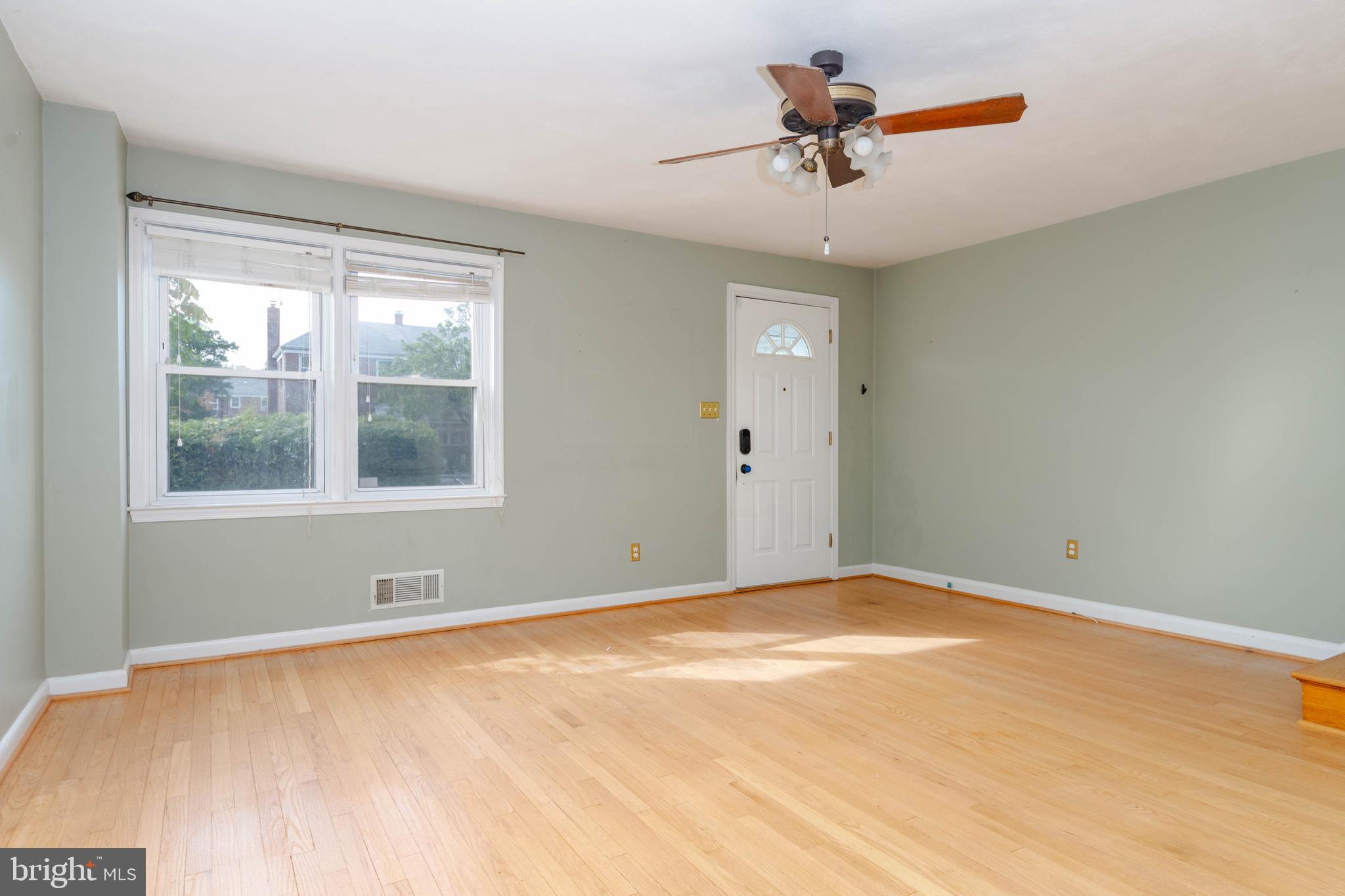 2256 Southorn Road Baltimore, MD 21220 - Photo 5 of 61 a view of a room with a window and a ceiling fan