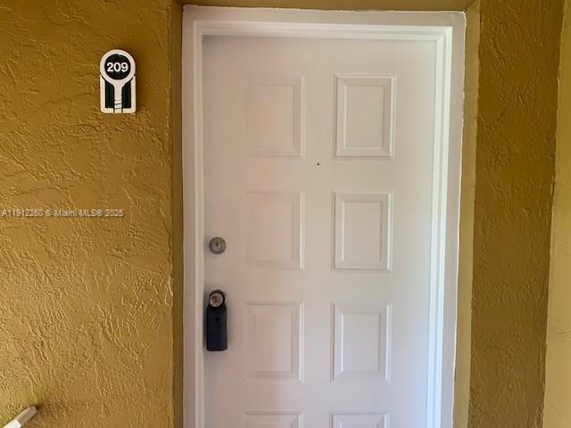 15630 Southwest 80th Street, Unit I209 Miami, FL 33193 - Photo 15 of 19 a bathroom with a shower