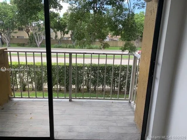 a bathroom with a bathtub and a toilet