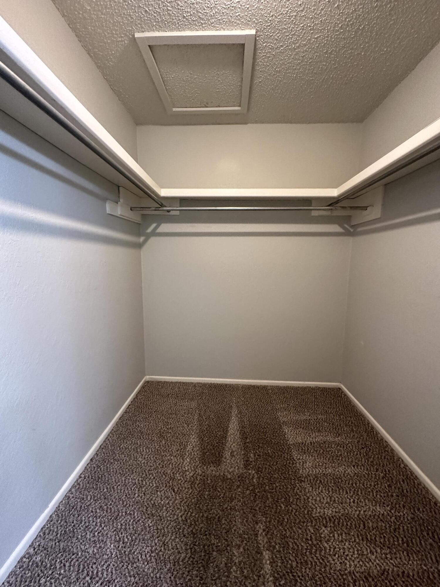 4804 71st Street Lubbock, TX 79424 - Photo 10 of 14 a view of a room with racks on the wall