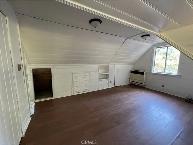 a view of a livingroom with an empty space and window