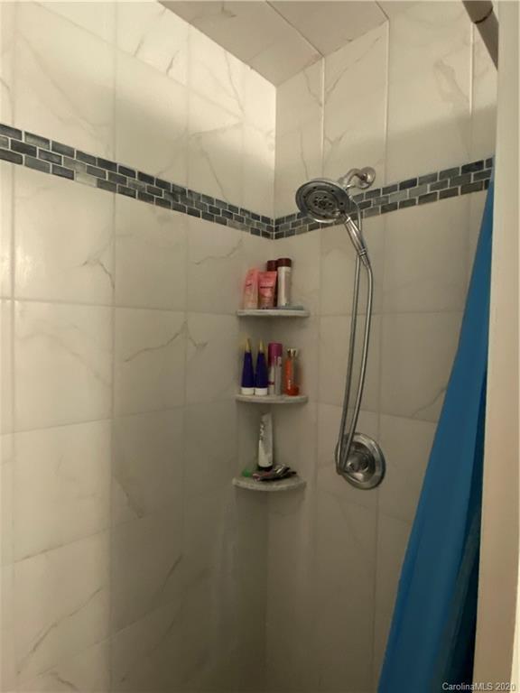103 Sycamore Road, Unit 208 Salisbury, NC 28147 - Photo 14 of 20 a bathroom with a shower