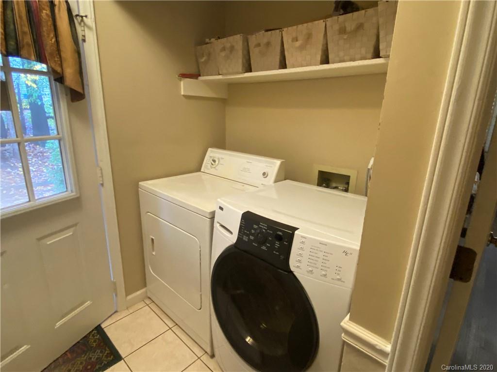 103 Sycamore Road, Unit 208 Salisbury, NC 28147 - Photo 17 of 20 a utility room with dryer and washer