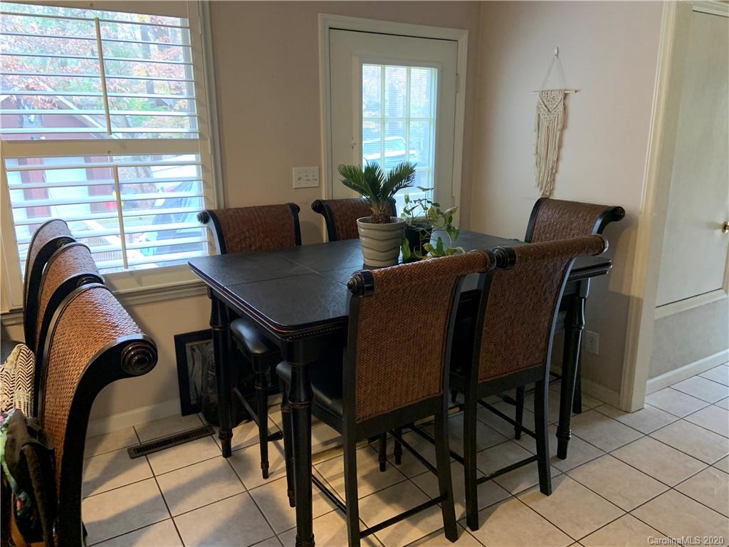 103 Sycamore Road, Unit 208 Salisbury, NC 28147 - Photo 5 of 20 a dining room with furniture and window
