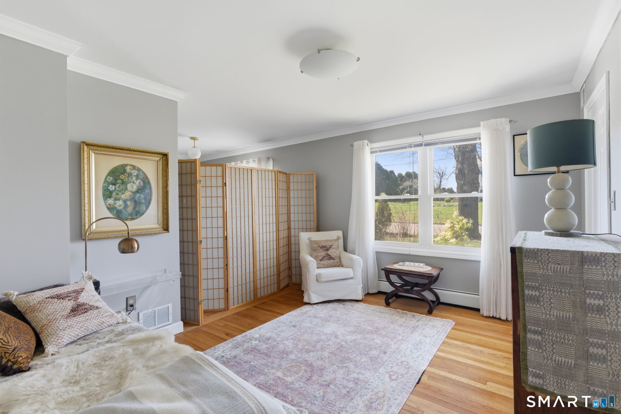 192 Dexter Avenue Meriden, CT 06450 - Photo 16 of 40 a bedroom with a couch and large windows