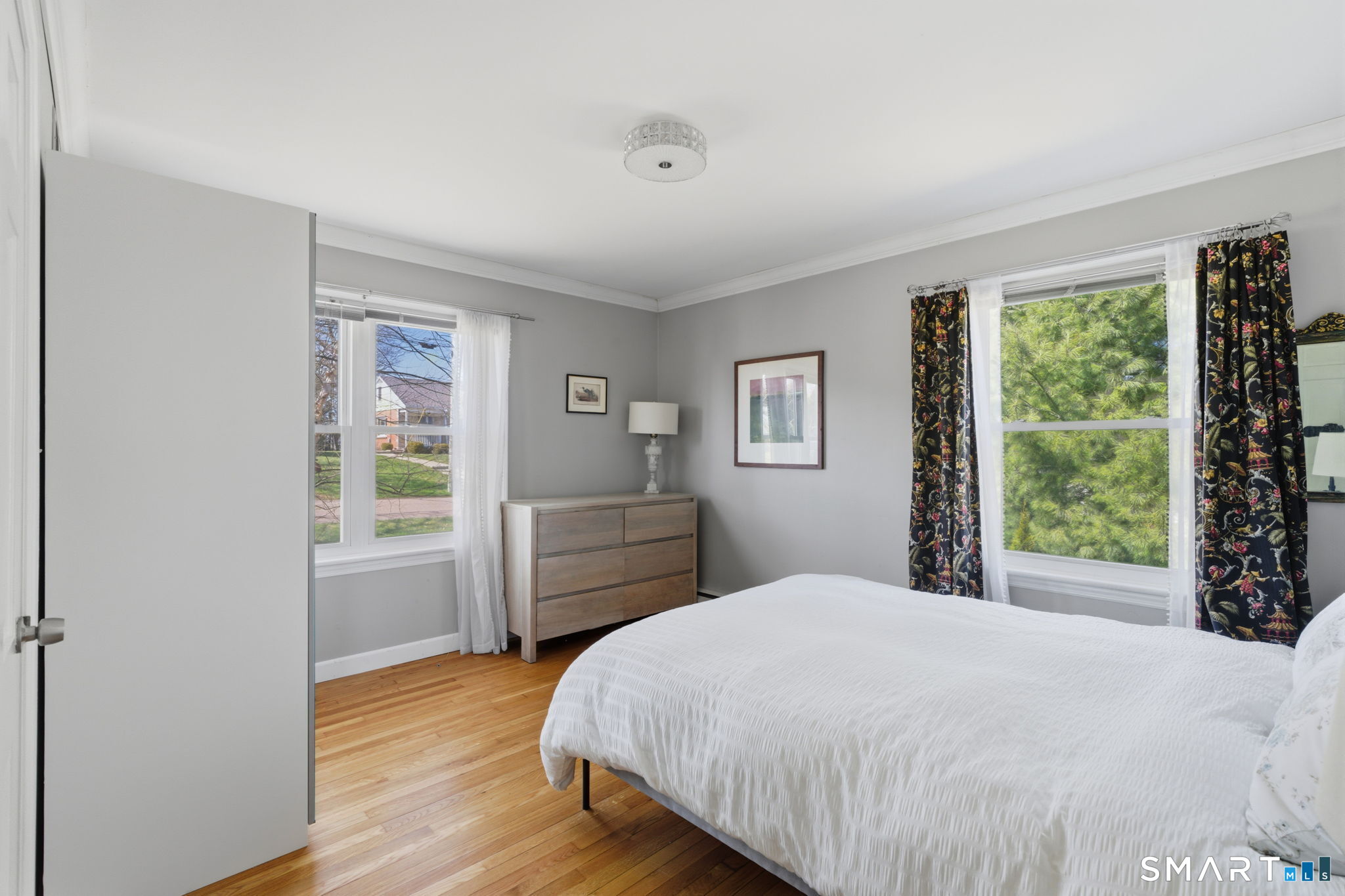 192 Dexter Avenue Meriden, CT 06450 - Photo 18 of 40 a bedroom with a bed and a window