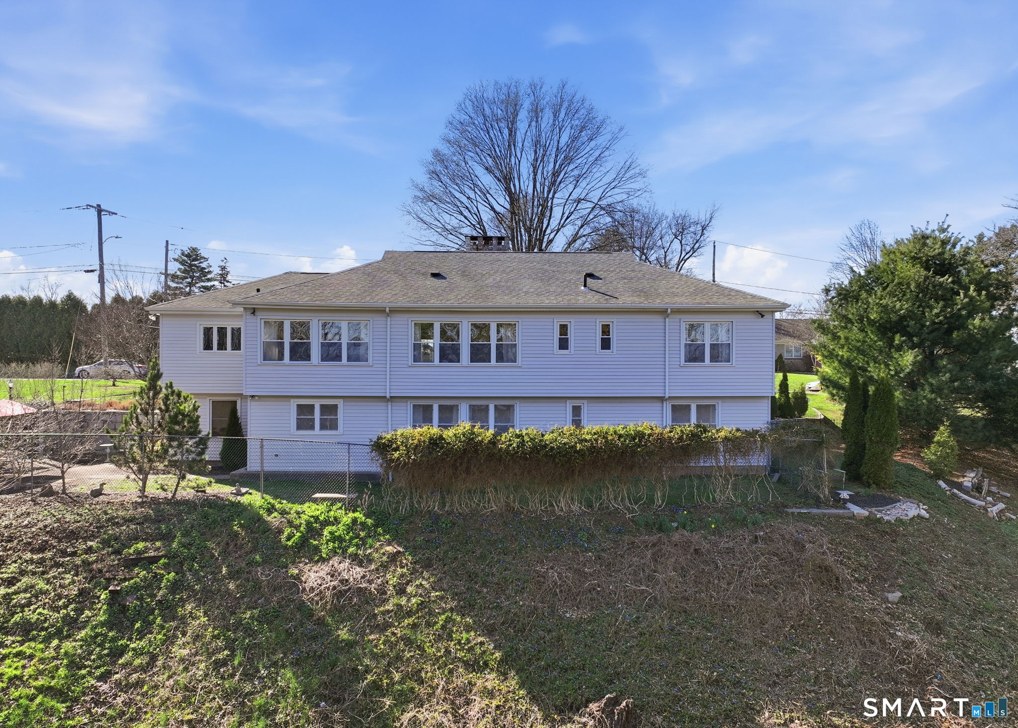 192 Dexter Avenue Meriden, CT 06450 - Photo 2 of 40 a view of a building with a yard
