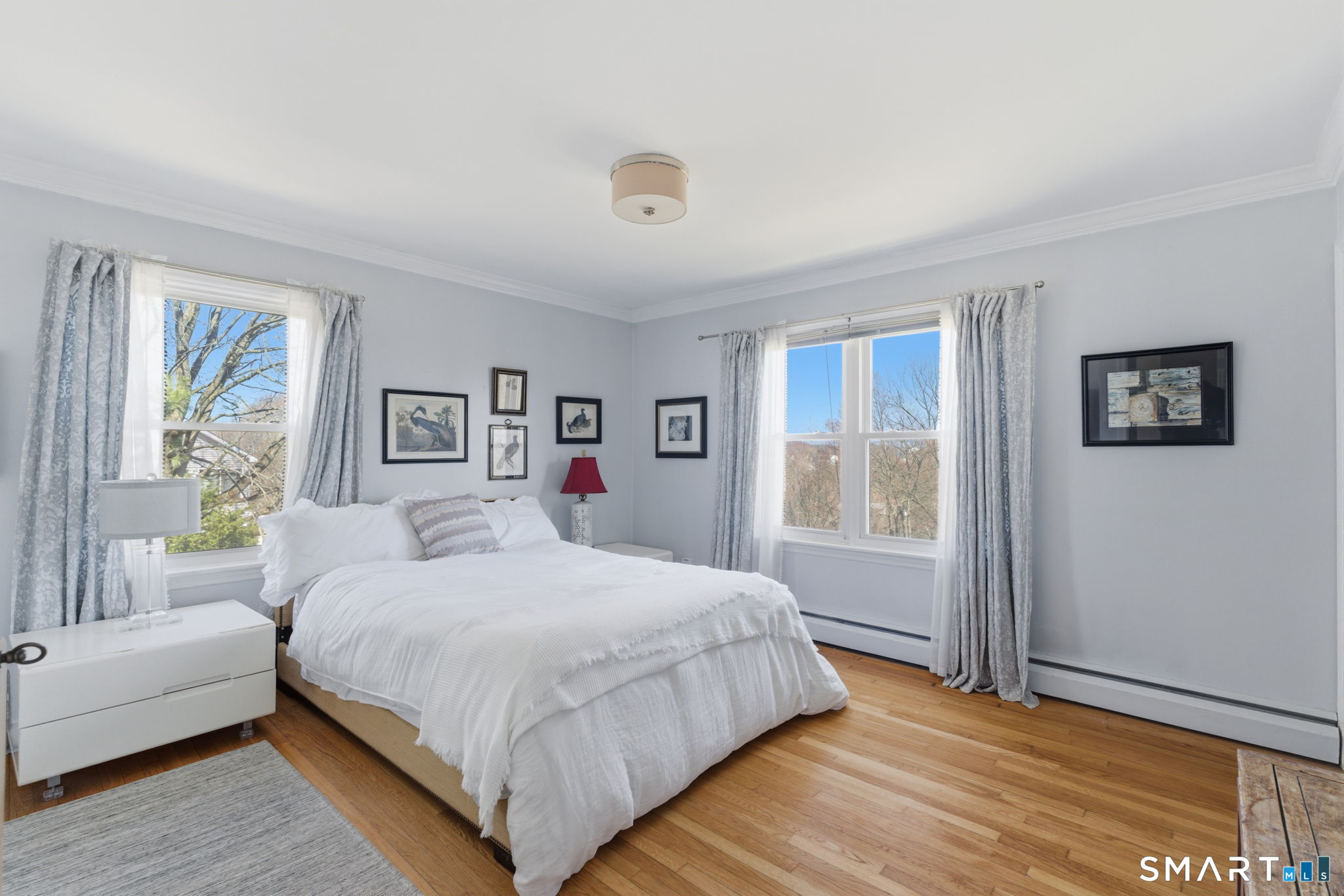 192 Dexter Avenue Meriden, CT 06450 - Photo 21 of 40 a bedroom with a large bed and a couch