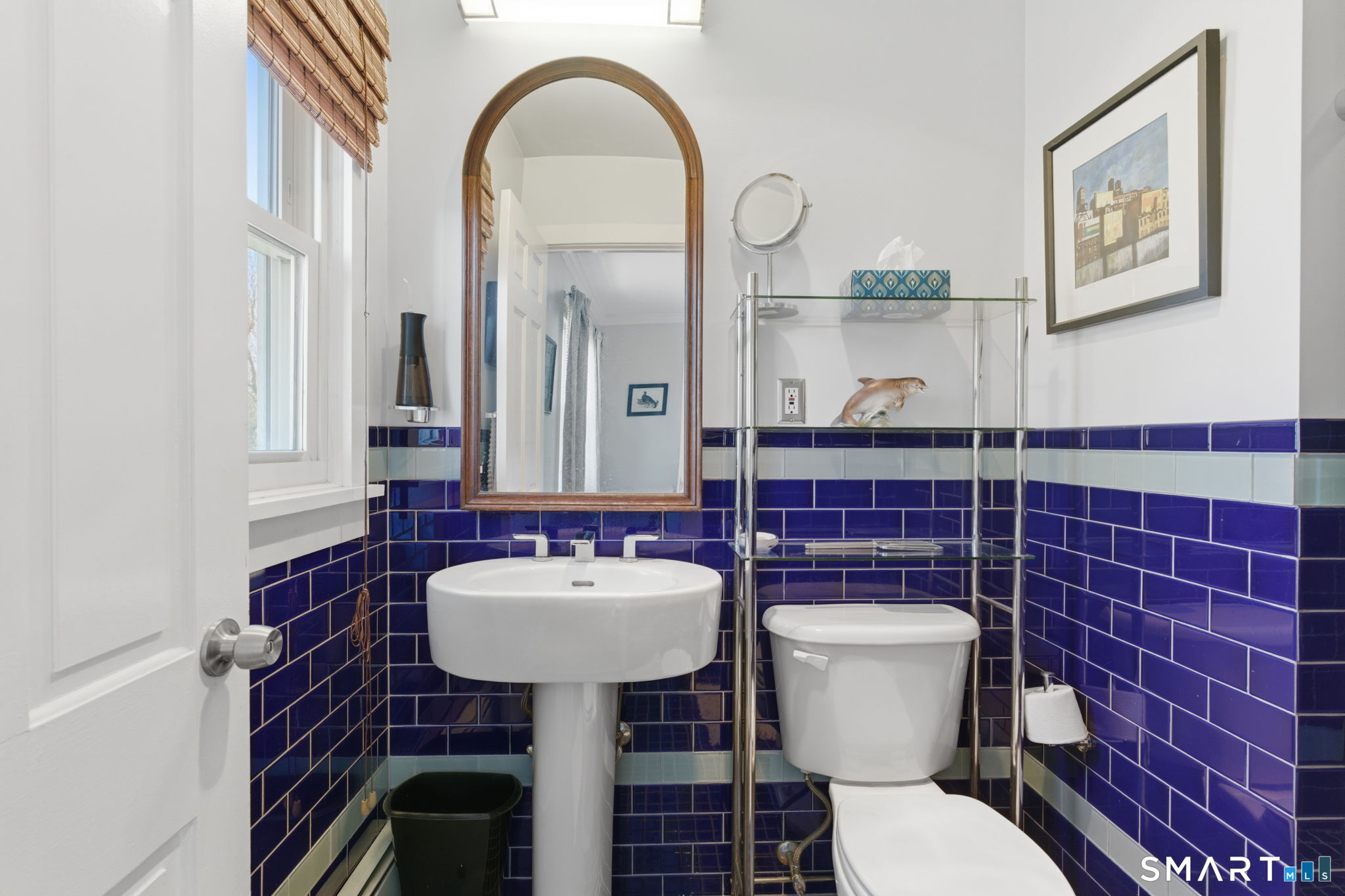192 Dexter Avenue Meriden, CT 06450 - Photo 23 of 40 a bathroom with a sink mirror and toilet