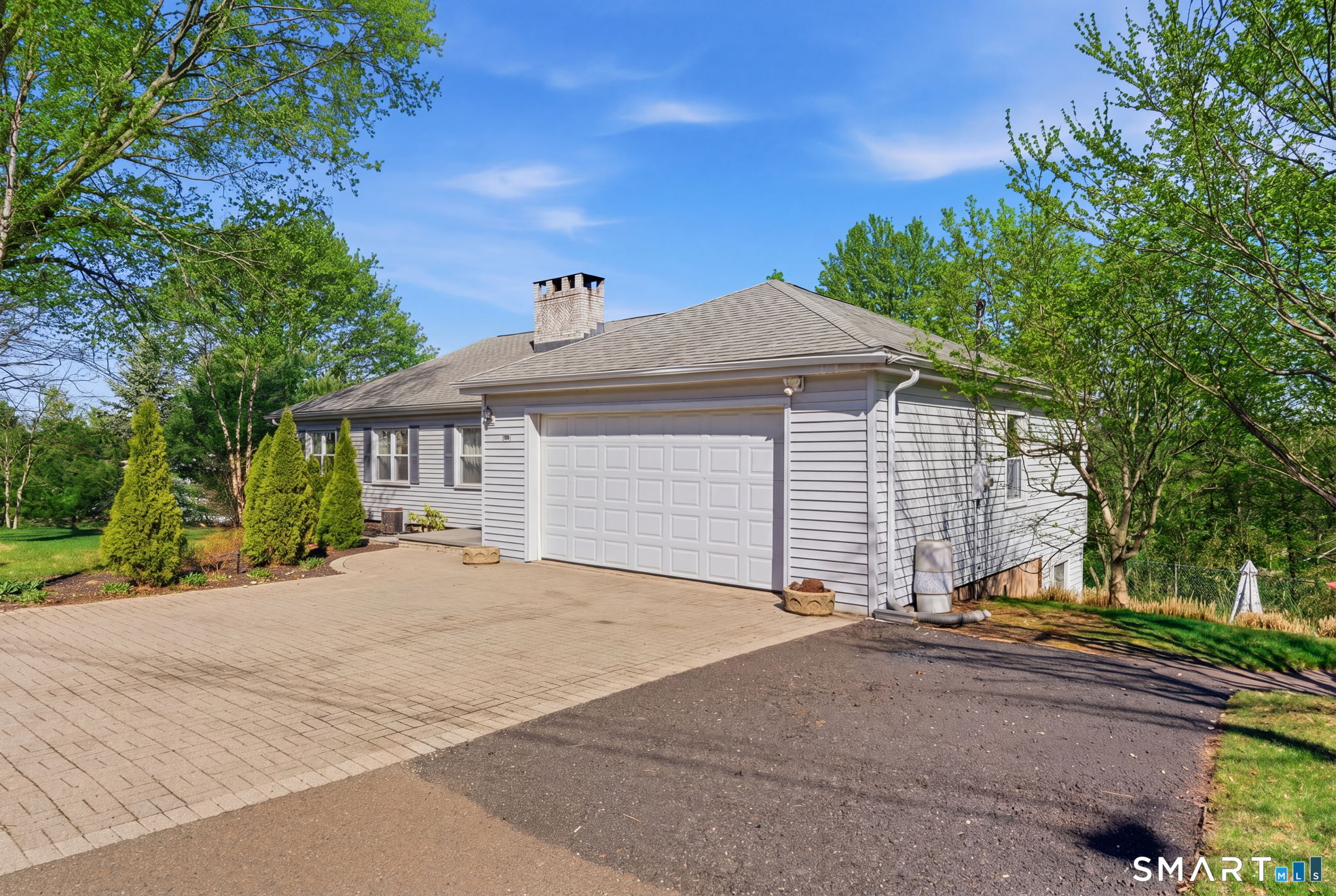 192 Dexter Avenue Meriden, CT 06450 - Photo 35 of 40 a front view of a house with a yard and trees