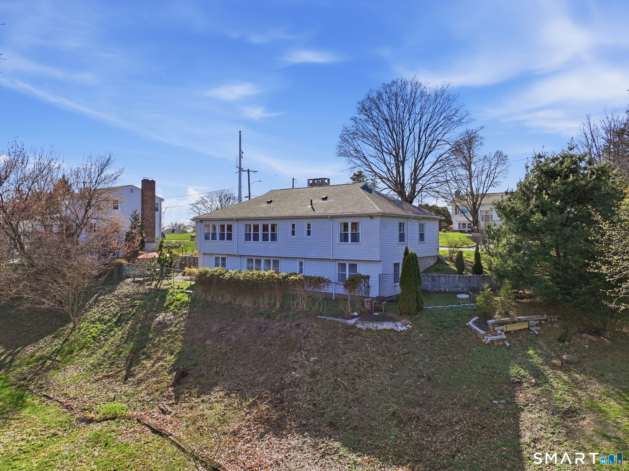 192 Dexter Avenue Meriden, CT 06450 - Photo 36 of 40 a view of a house with a yard