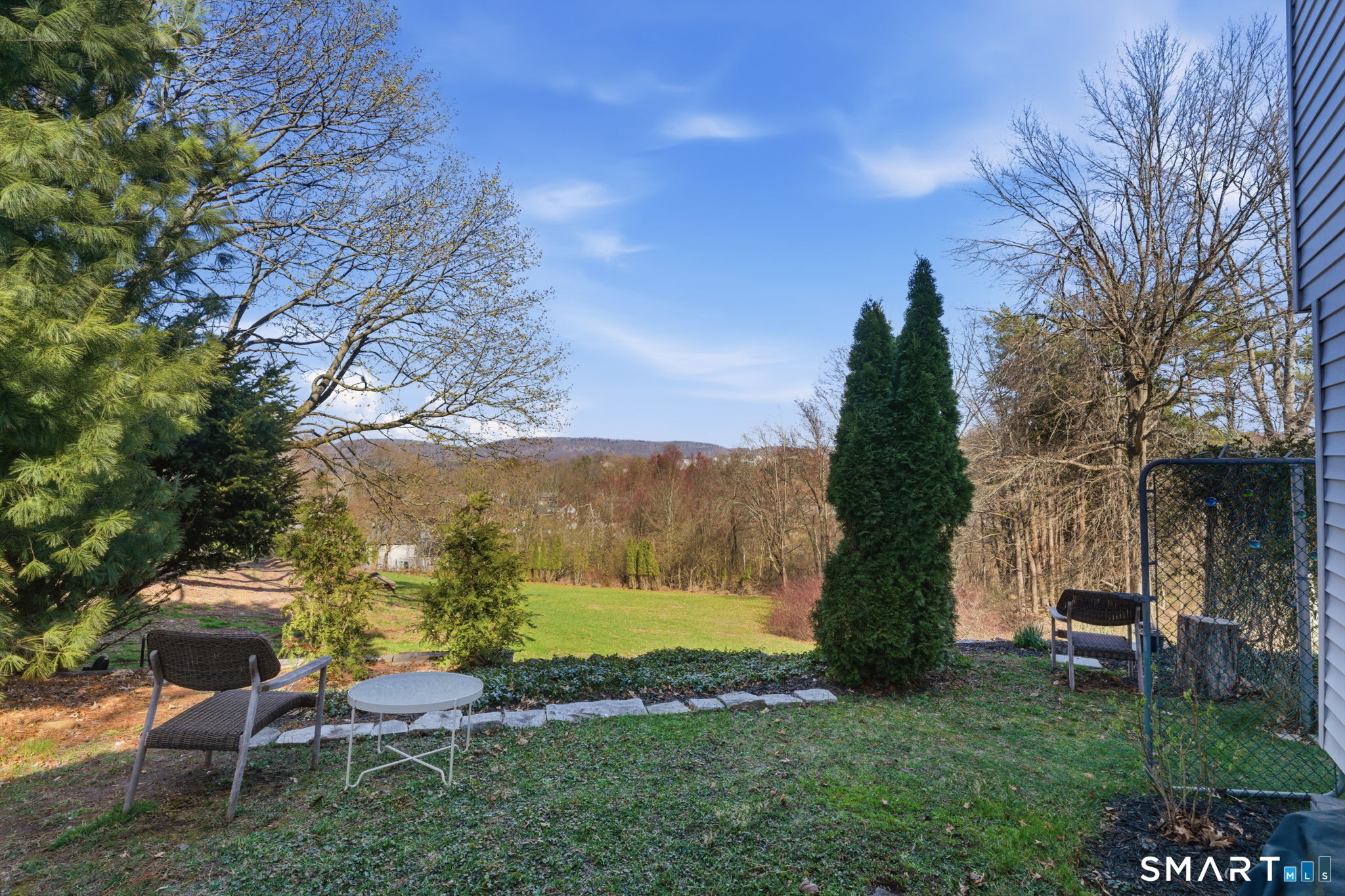 192 Dexter Avenue Meriden, CT 06450 - Photo 39 of 40 a view of a chairs and table in backyard