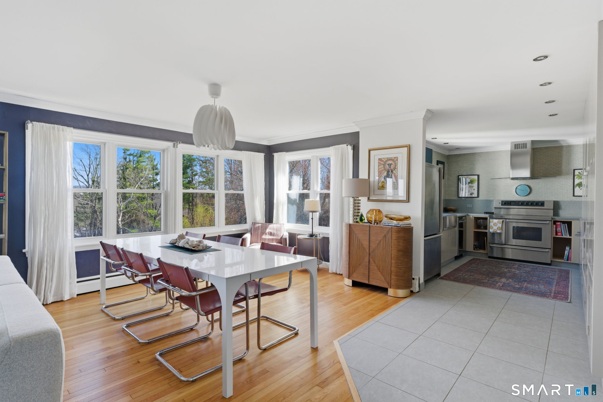 192 Dexter Avenue Meriden, CT 06450 - Photo 10 of 40 a view of a dining room with furniture window and outside view