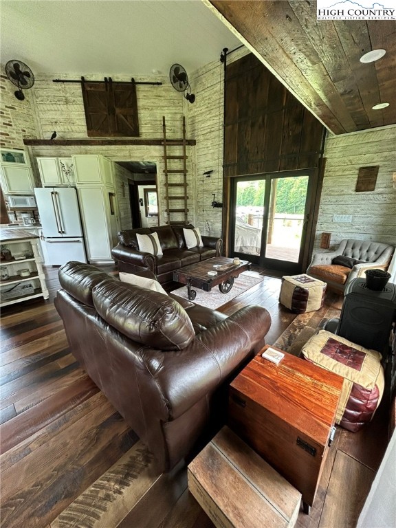 972 West Deep Ford Road Lansing, NC 28643 - Photo 11 of 45 a living room with furniture and a fireplace