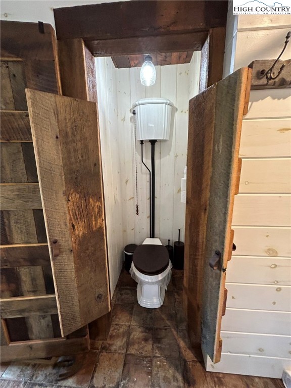 972 West Deep Ford Road Lansing, NC 28643 - Photo 23 of 45 a bathroom with a toilet and a shower