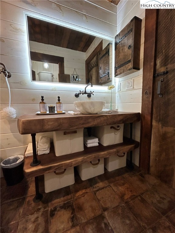 972 West Deep Ford Road Lansing, NC 28643 - Photo 25 of 45 a bathroom with a sink a mirror and a toilet