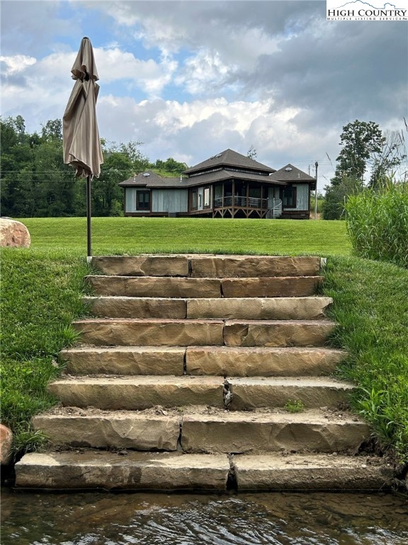 972 West Deep Ford Road Lansing, NC 28643 - Photo 6 of 45 a view of a garden with a slide