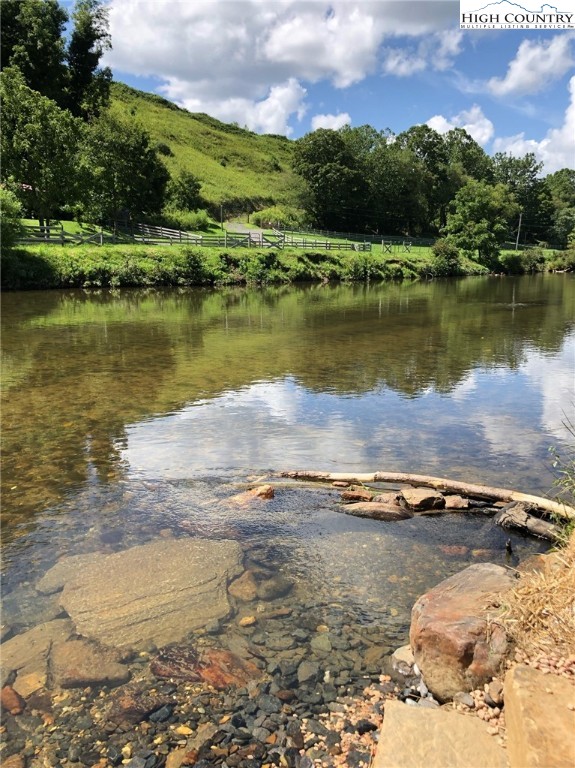 972 West Deep Ford Road Lansing, NC 28643 - Photo 8 of 45 a view of a lake with houses