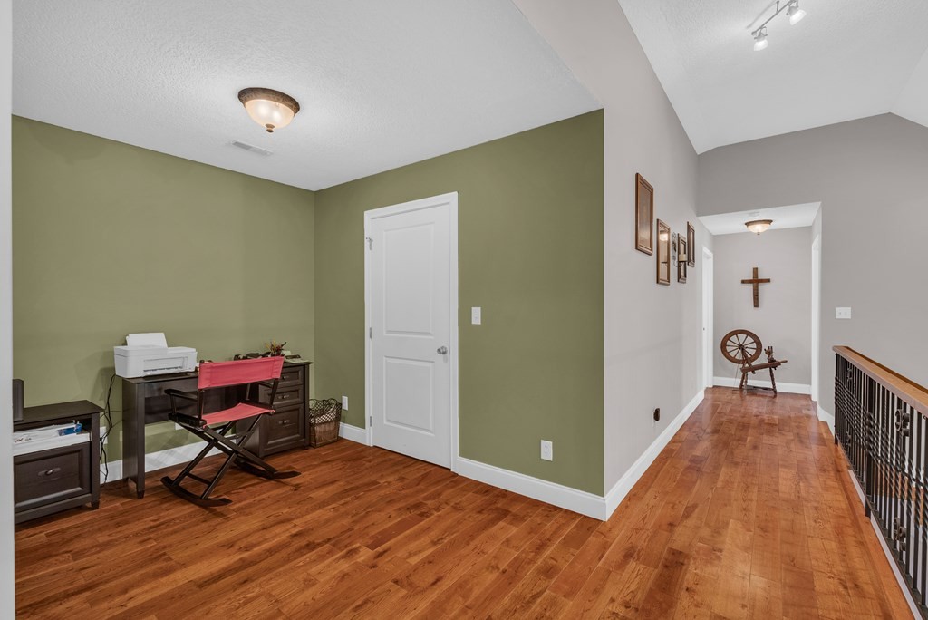 465 Hickory Lane Sparta, TN 38583 - Photo 40 of 46 a view of a hallway with wooden floor and furniture