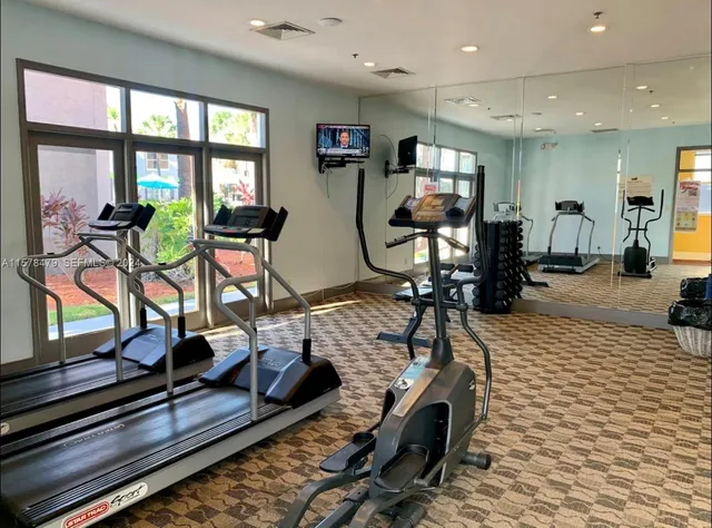 a view of a room with gym equipment