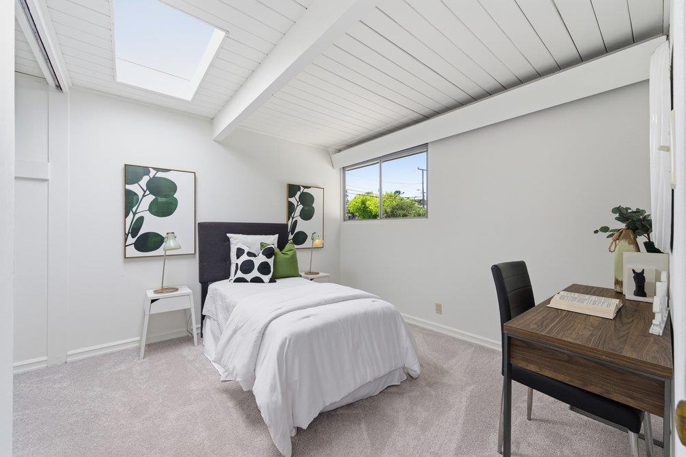 2203 Allegheny Way San Mateo, CA 94402 - Photo 28 of 56 a bedroom with a bed table and a window