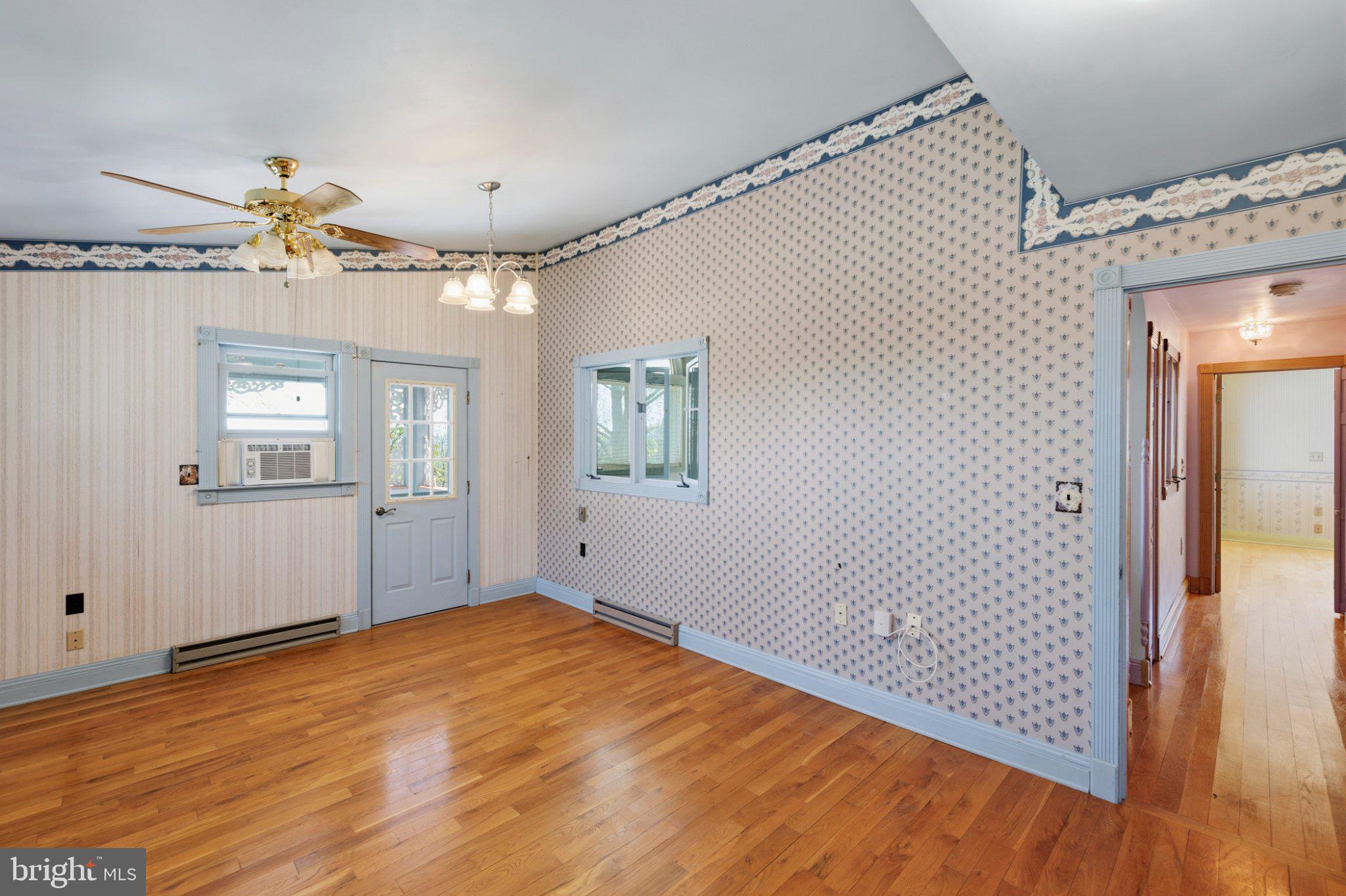 777 Glengary Road Winchester, VA 22603 - Photo 28 of 69 wooden floor in an empty room with a window