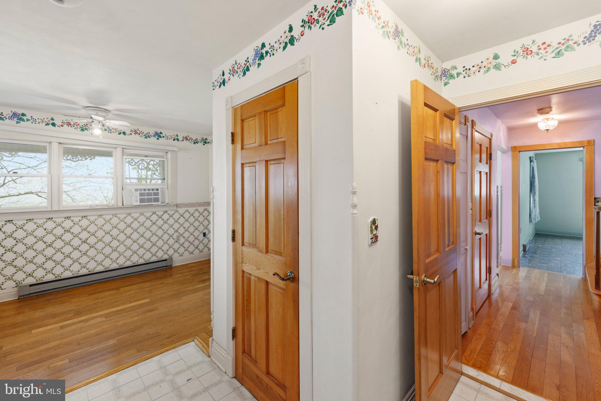 777 Glengary Road Winchester, VA 22603 - Photo 35 of 69 a view of a hallway with wooden floor and cabinet
