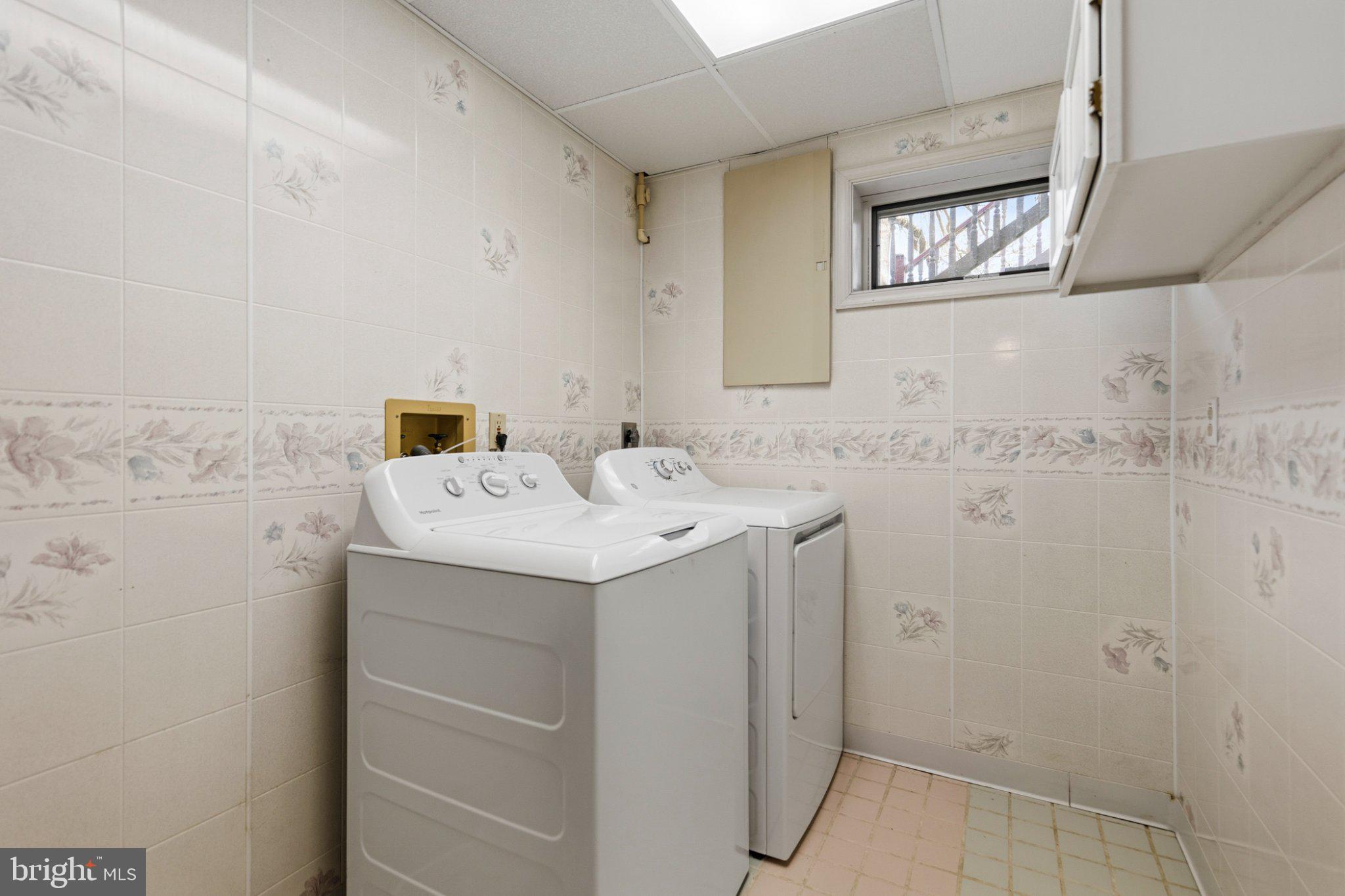 777 Glengary Road Winchester, VA 22603 - Photo 46 of 69 a utility room with a sink dryer and washer