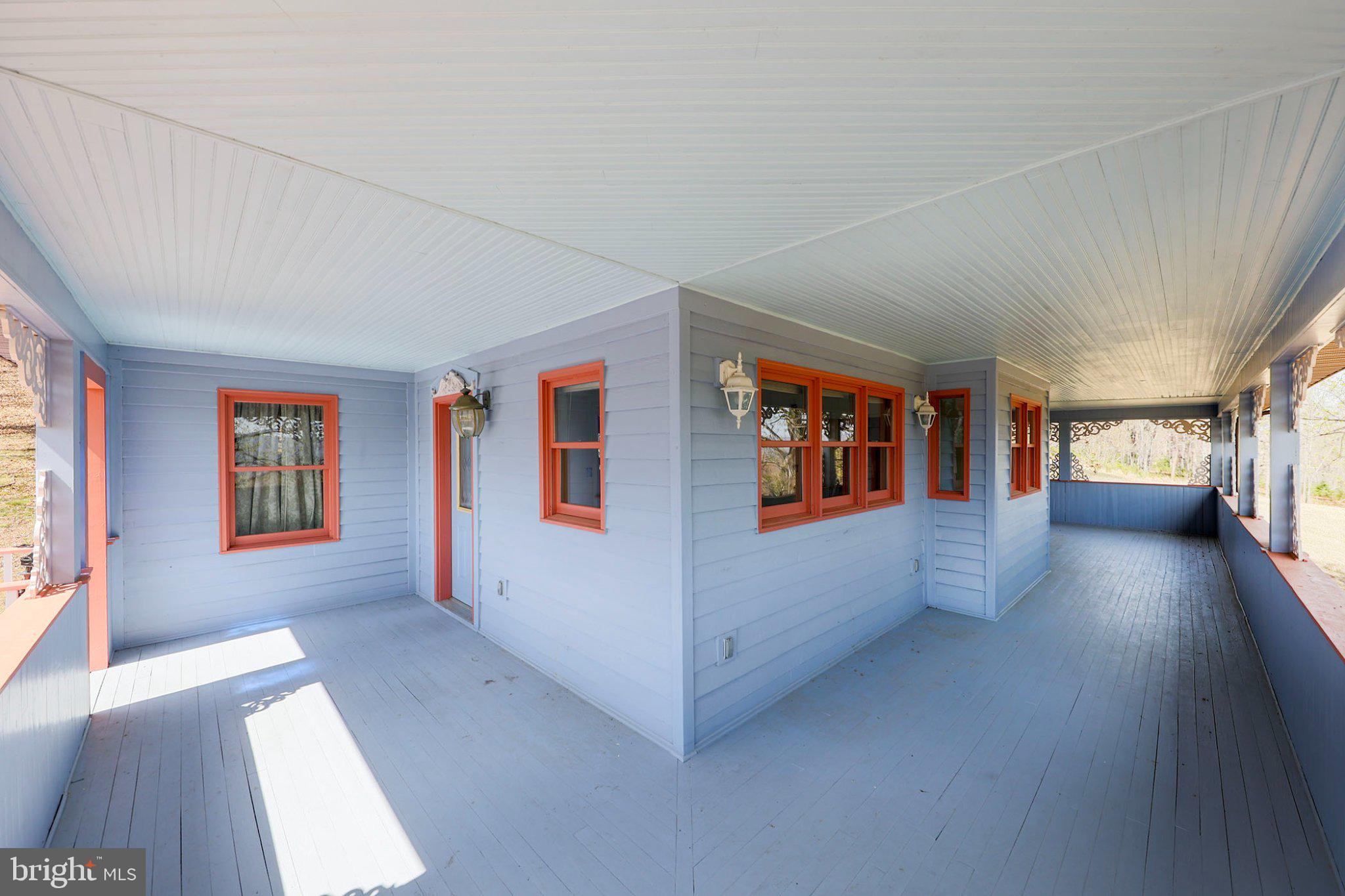 777 Glengary Road Winchester, VA 22603 - Photo 48 of 69 a view of an empty room with window and wooden floor