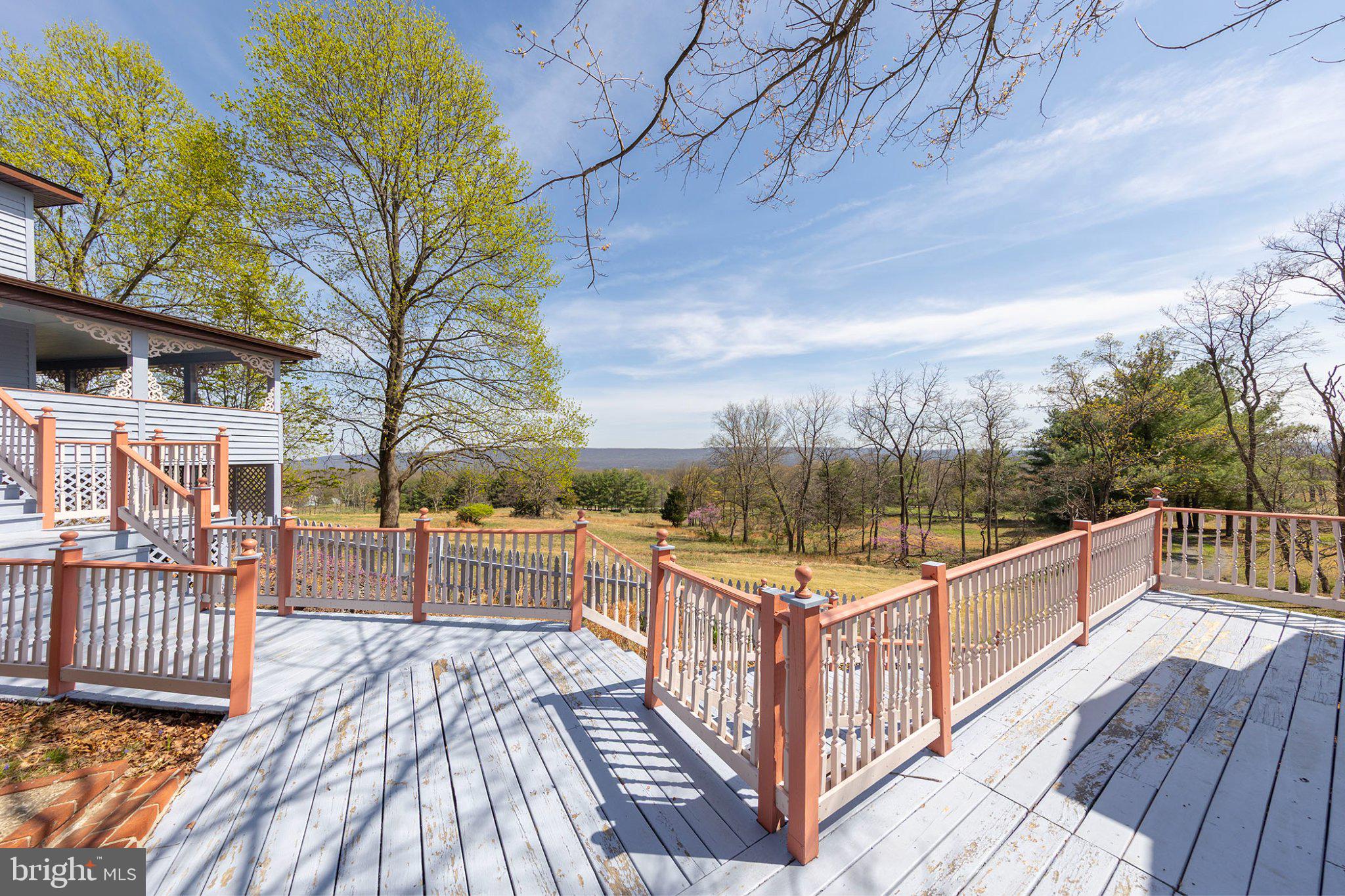 777 Glengary Road Winchester, VA 22603 - Photo 59 of 69 a view of a balcony with wooden floor and fence