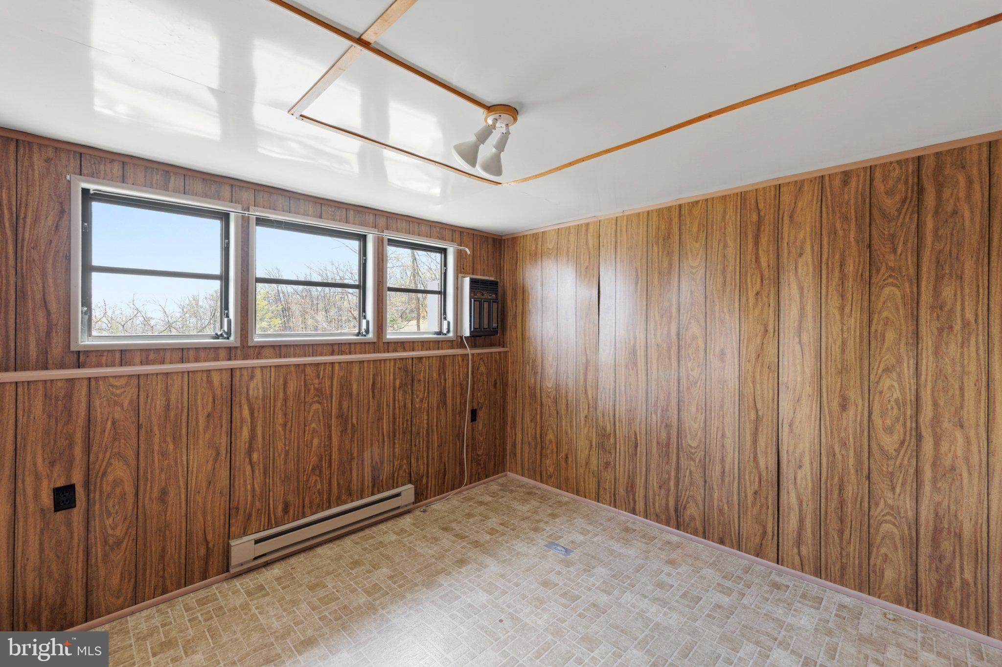 777 Glengary Road Winchester, VA 22603 - Photo 62 of 69 a view of an empty room with a window