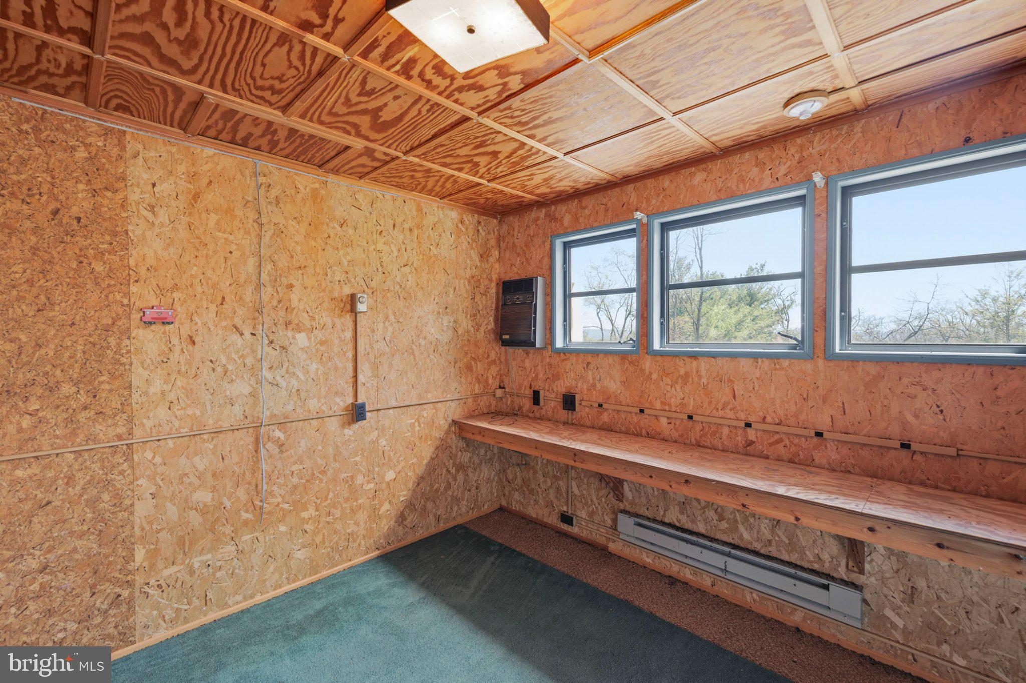 777 Glengary Road Winchester, VA 22603 - Photo 64 of 69 a bathroom with a sink and a large mirror