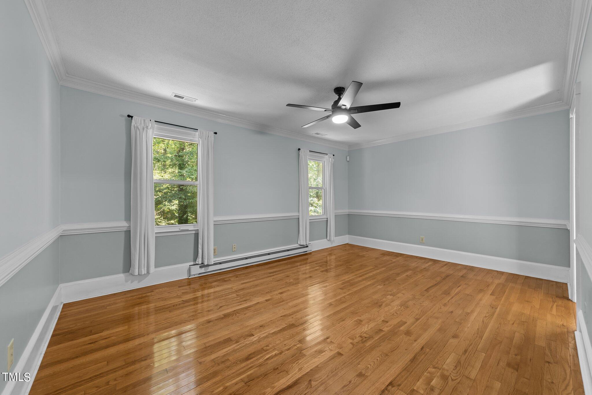 1104 Terrace Court Raleigh, NC 27615 - Photo 9 of 39 a view of an empty room with a window