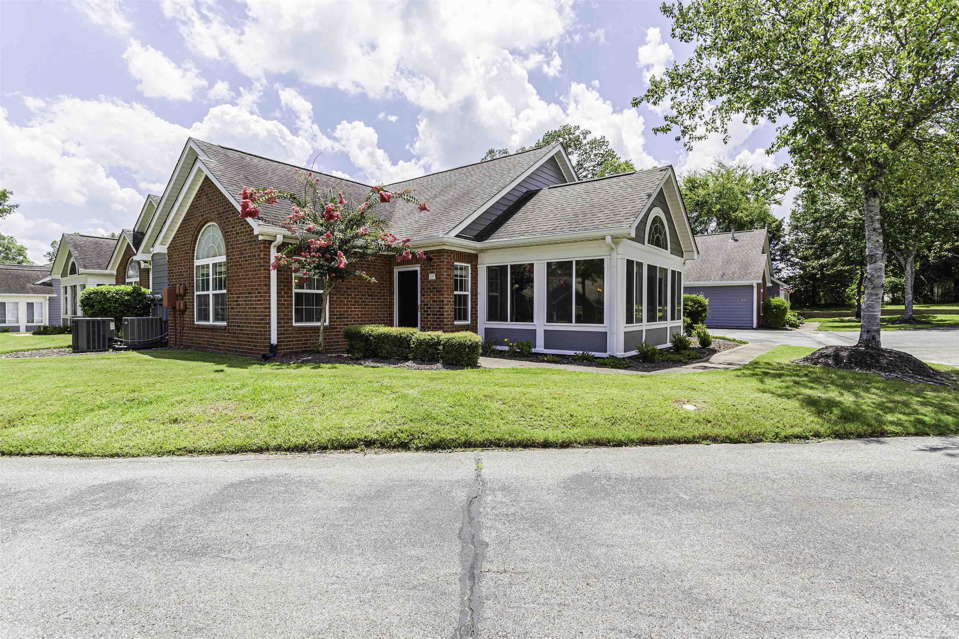 1187 Oak Timber Circle, Unit 33 Collierville, TN 38017 - Photo 12 of 22 a front view of house with yard and green space