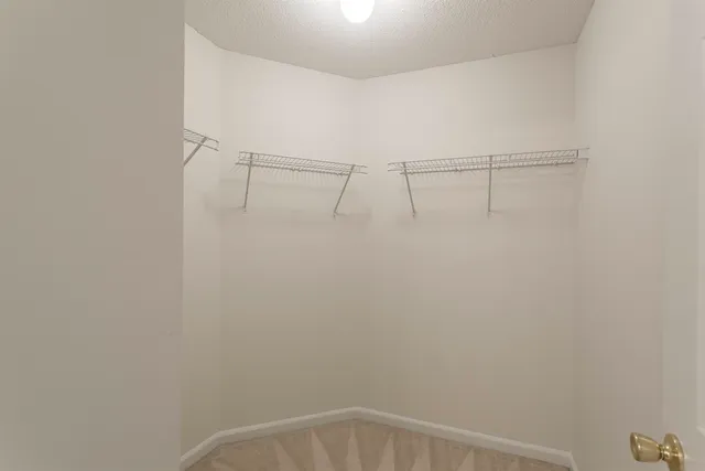 a view of a room with racks on the wall