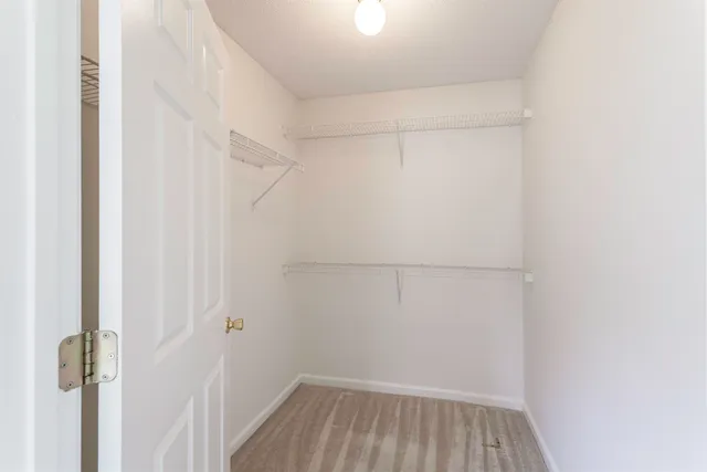 a view of a room with racks on the wall