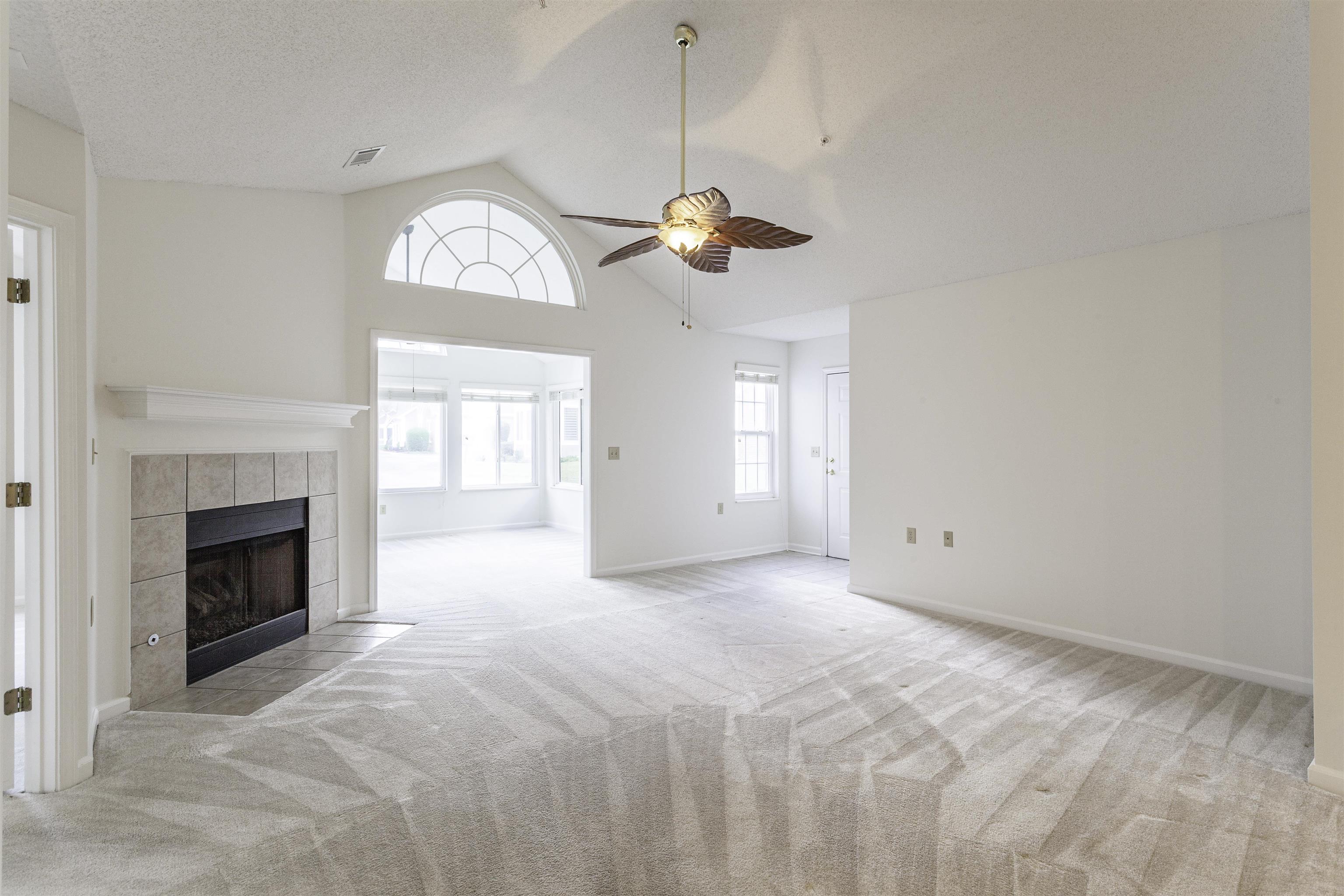 1187 Oak Timber Circle, Unit 33 Collierville, TN 38017 - Photo 3 of 22 a view of empty room with a fireplace