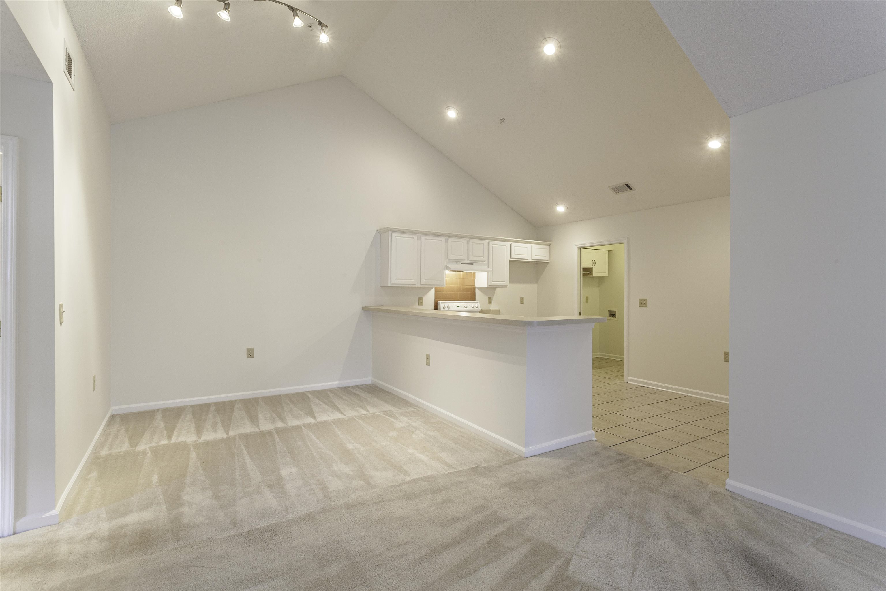 1187 Oak Timber Circle, Unit 33 Collierville, TN 38017 - Photo 4 of 22 a view of kitchen with center island and wooden floor