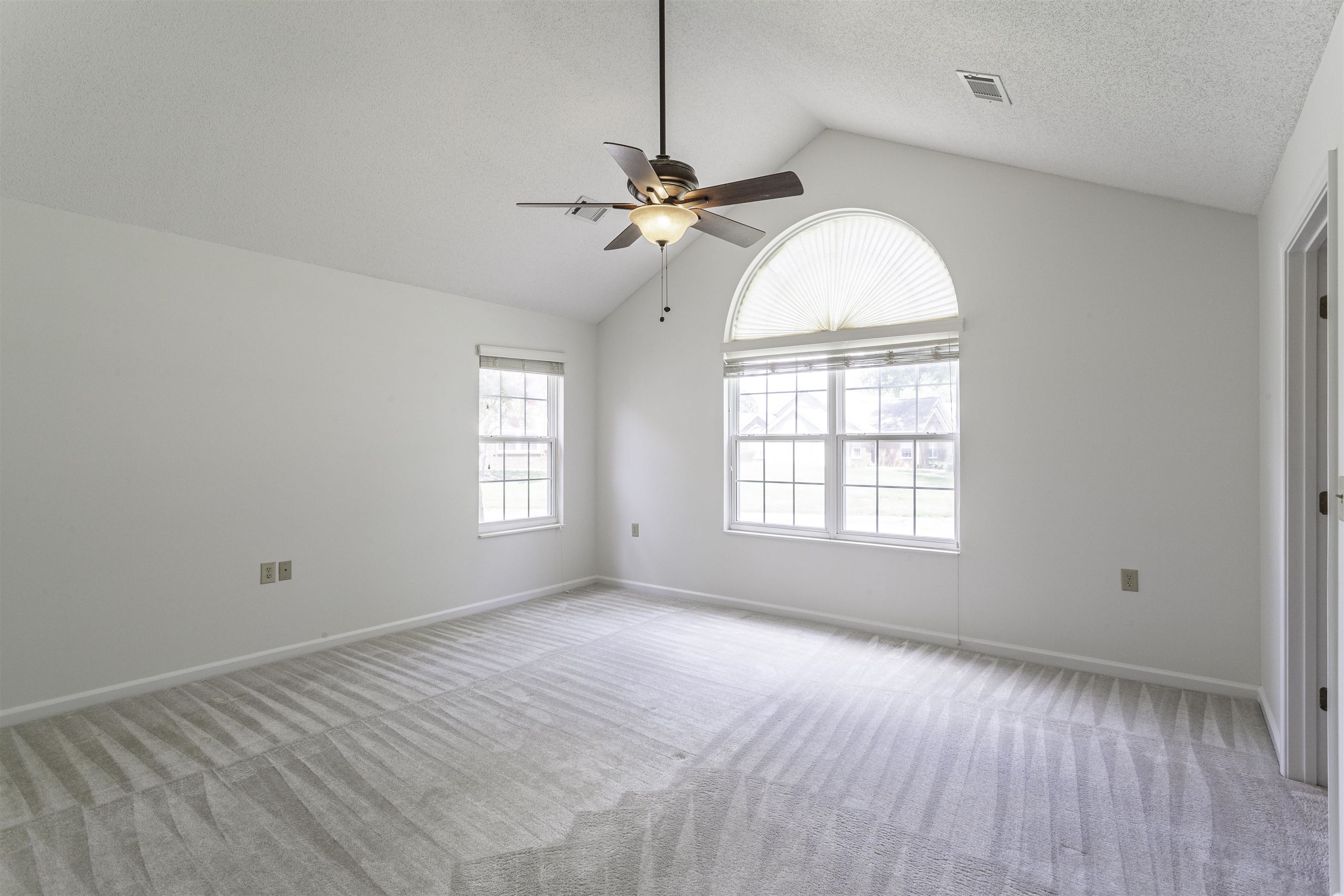 1187 Oak Timber Circle, Unit 33 Collierville, TN 38017 - Photo 7 of 22 a view of a room with window and ceiling fan