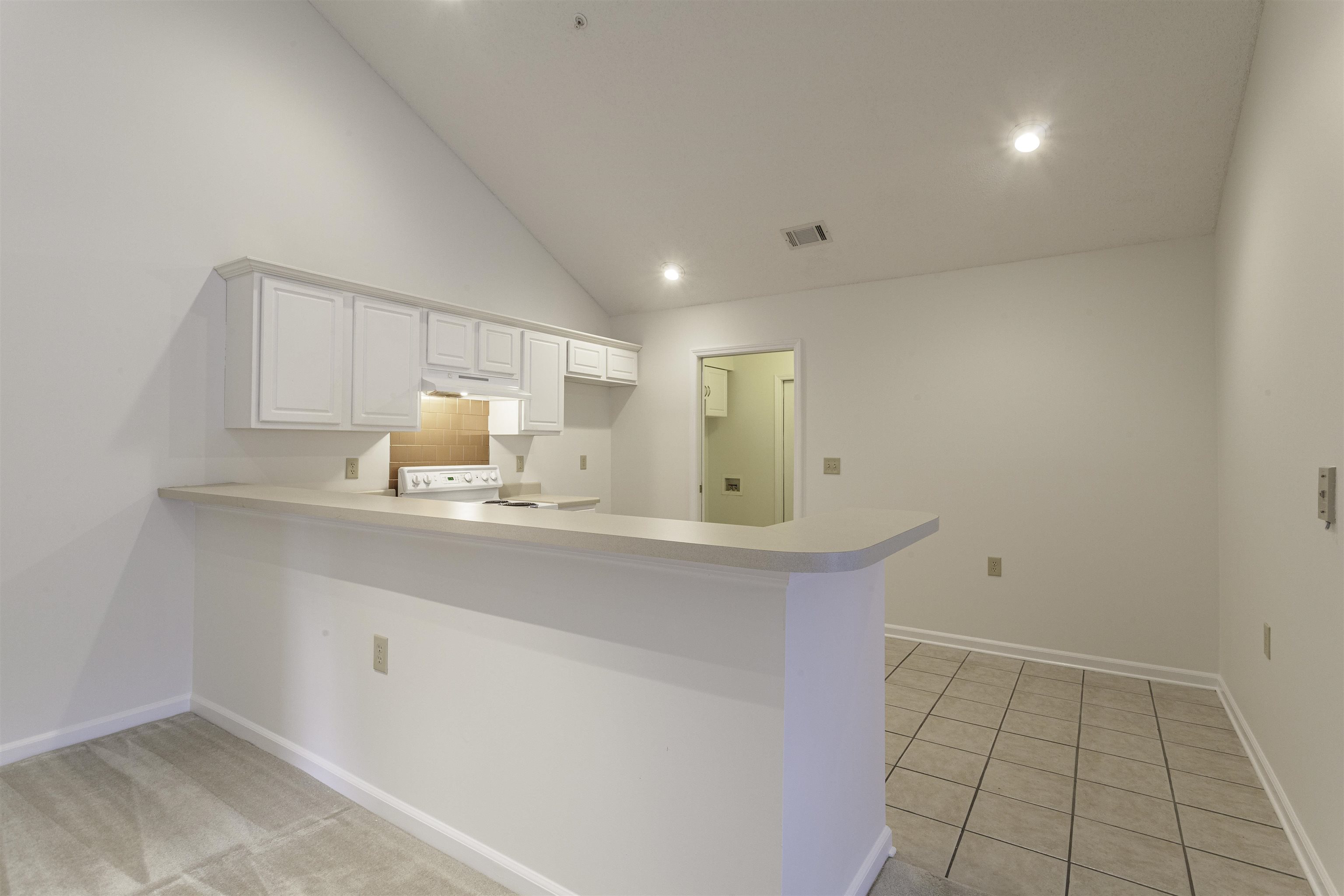 1187 Oak Timber Circle, Unit 33 Collierville, TN 38017 - Photo 8 of 22 a kitchen with a sink cabinets and appliances