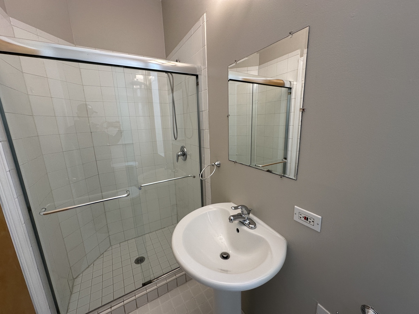 3946 North Cicero Avenue, Unit 1 Chicago, IL 60641 - Photo 15 of 17 a bathroom with a sink and mirror